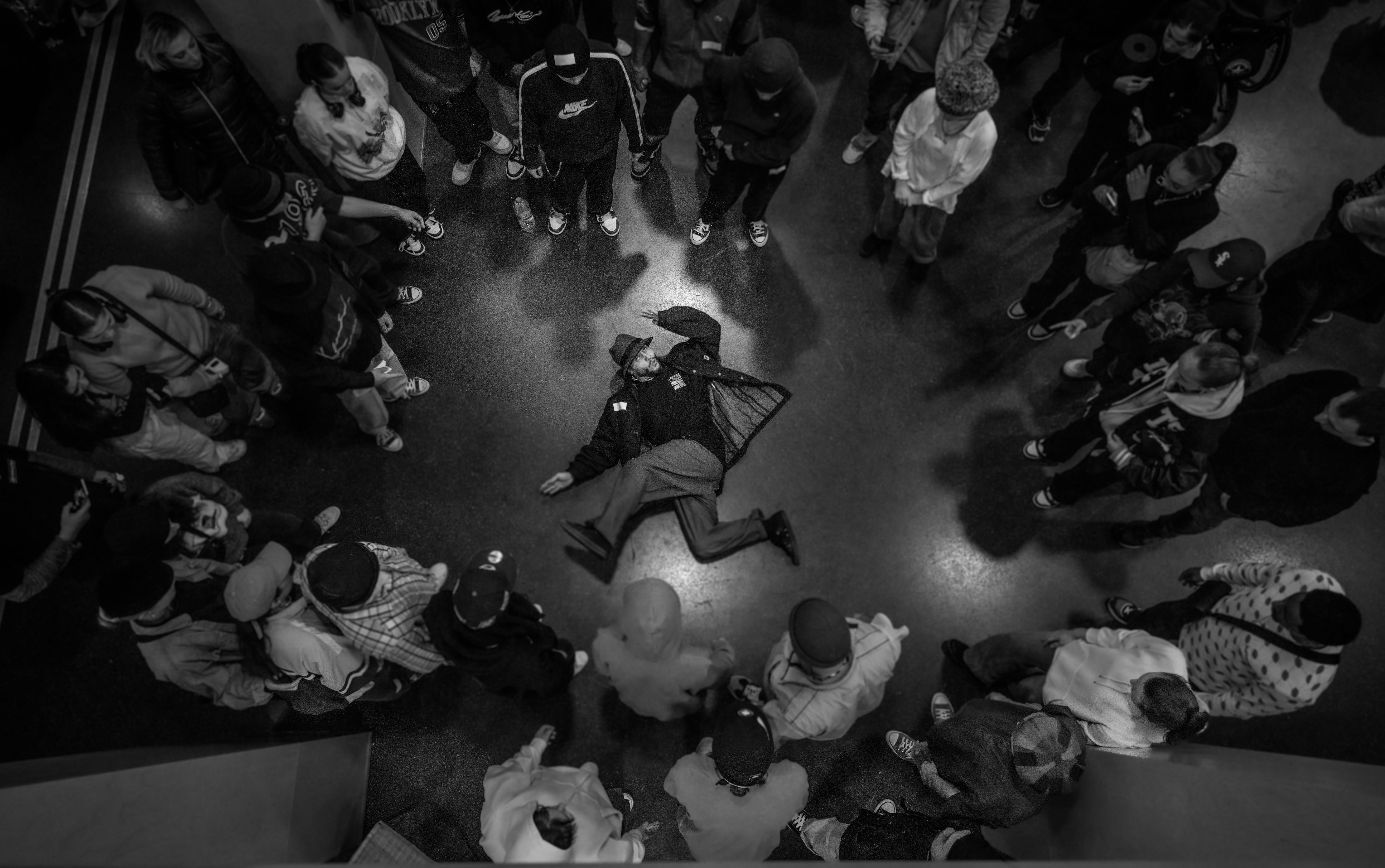 Top Down view of a Popping Dancer doing Floor work